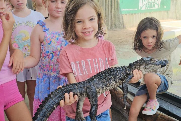 a little girl posing for a picture
